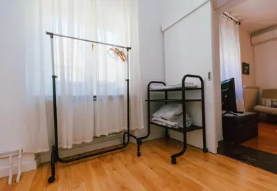 a dog sleeping on a bunk bed in a room at B&B Vransko 29 in Vransko