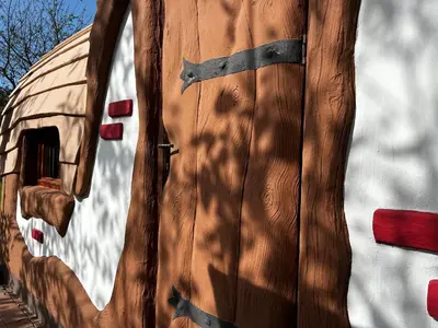a close up of a wooden shirt on a building at Glamping PEC - HALFBOARD in Selnica ob Dravi