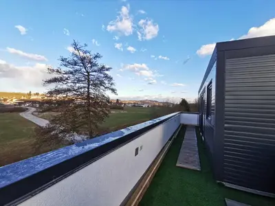 a view from the balcony of a house at Roof Apartment ART-PE in Trebnje