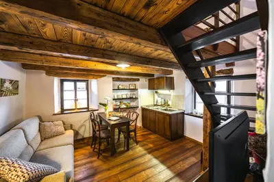 a living room with a couch and a table at House Marica in Šmartno
