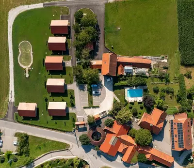 an overhead view of a house in a suburb at Martinova izba - Family Bungalows in Laško