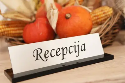 a sign with the word recederror next to a basket of vegetables at Apartma Vila Zigmund in Cerknica