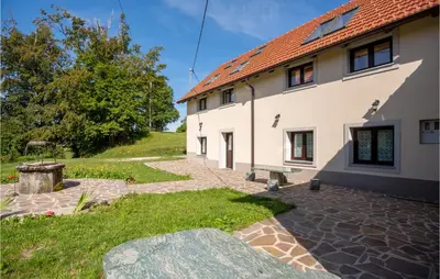 a building with a bench in front of it at 3 Bedroom Pet Friendly Home In Col in Zoll