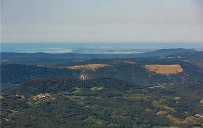 an aerial view of a mountain with trees and water at 3 Bedroom Pet Friendly Home In Col in Zoll