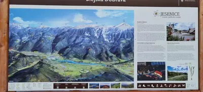 a poster of a picture of a mountain at Primula Apartment in Blejska Dobrava