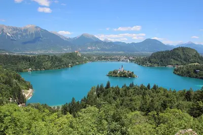 an island in the middle of a lake at BledLake4U Apartment in Bled