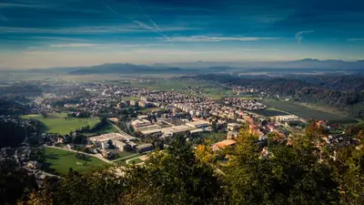 an aerial view of a city with buildings at Guest House Pri Cesarju in Kamnik