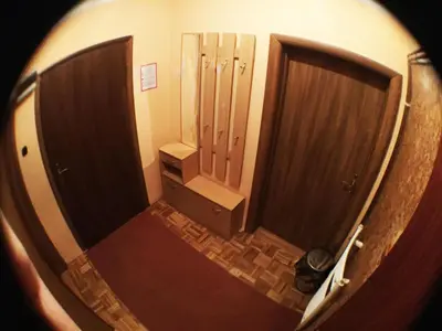 an overhead view of a hallway with two doors at Guest House Pikapolonca in Maribor