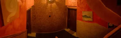 a small room with a staircase in a building at Guest House Pikapolonca in Maribor