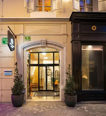 an entrance to a building with a glass door at Hotel Heritage in Ljubljana