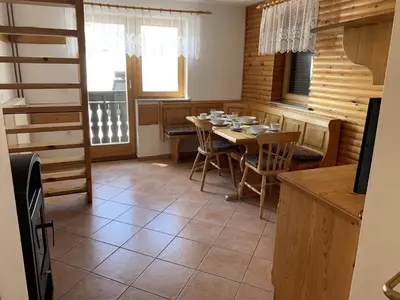 a dining room with a table and chairs at Apartments Nune in Zreče