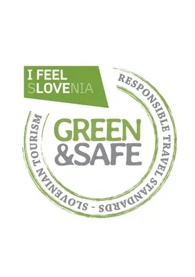 a green and safe label with the text i feel above nita and green at GOZDNE VILE va VRTI in Kostel