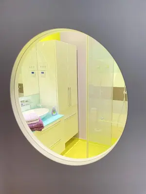 a white bathroom with a sink and a mirror at Apartment Ljubljana in Ljubljana