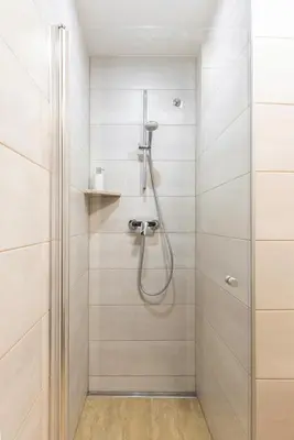 a bathroom with a shower with a glass door at Apartment Franko in Radovljica