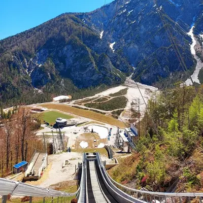 a set of train tracks on the side of a mountain at Villa Nebina in Rateče