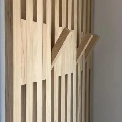 a wooden wall with vertical lines on it at Emerald Valley Apartments in Bovec
