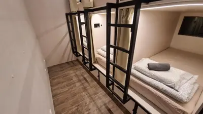 a group of bunk beds in a room at Cabin HOSTEL in Ljubljana
