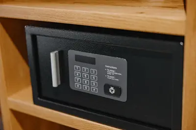 a microwave oven sitting on top of a wooden shelf at ONE66 Hotel in Ljubljana