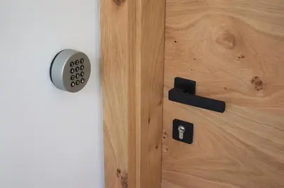 a close up of a wooden door with a lock at Cirus apartments in Kočevje