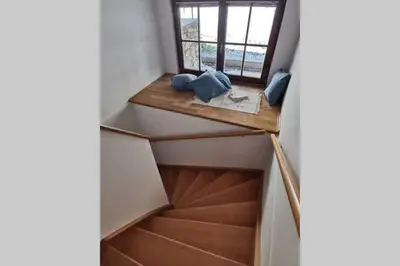 a small room with a staircase in a house at My House in Bovec