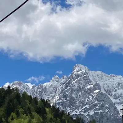 a view of a snow covered mountain at Pri Marusi in Kranjska Gora