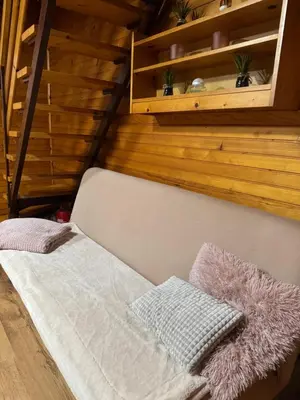 a bed with two pillows on it in a room at Teddy in Čatež ob Savi