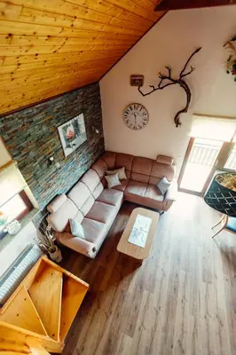 an overhead view of a living room with a couch at Zidanica Bahor in Črnomelj