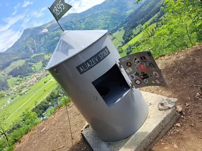 a machine sitting on the side of a mountain at Koča Martuljek in Gozd Martuljek