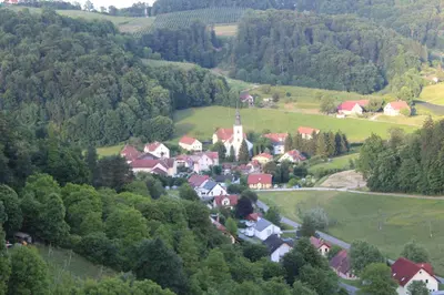 an aerial view of a small village in the hills at Sleeping in Village in Svečina