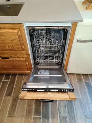 an oven with its door open in a kitchen at Zidanica Žagar in Dolenjske Toplice