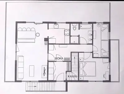 a black and white floor plan of a house at Hiša Lojz in Žaga