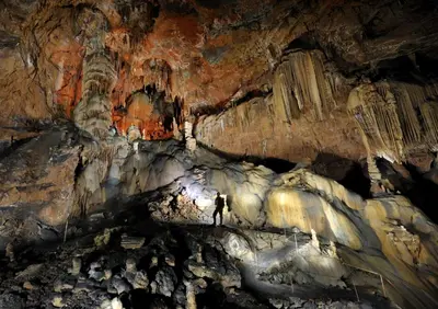 a man standing inside a cave at Villa Lavanda in Kriz Sezana with private swimpool in Sežana