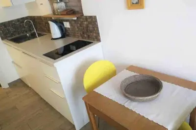 a kitchen with a table with a bowl on it at OLD TOWN 14 in Ljubljana