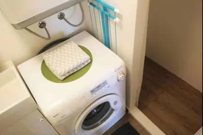 a washer and dryer in a small room at OLD TOWN 14 in Ljubljana