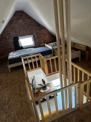 an overhead view of a room with two bunk beds at Hiša Srečo in Begunje na Gorenjskem