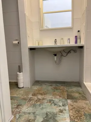 a bathroom with a sink and a mirror at INDUSTRIAL STUDIO 2 in Ljubljana
