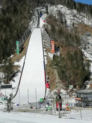 a ski slope with a ramp in the snow at Žbogar in Rateče