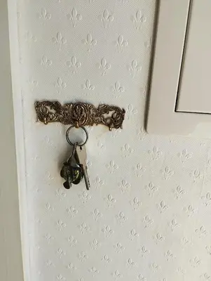 a pair of keys hanging on a wall at ECO-LUX APART with free bicycles end free parking in Ljubljana