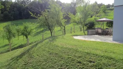 a view of a yard with a table and chairs at Grajsko in Metlika
