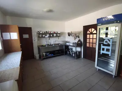 a small kitchen with a sink and a counter at Park Istra holiday home in Koper