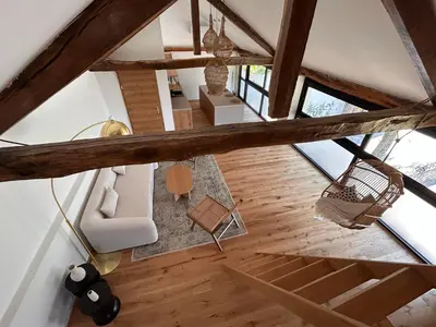 an overhead view of a living room with wooden ceilings at Škerlj Wine Estate in Tomaj