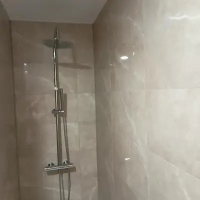 a shower in a bathroom with a shower at APARTMAJI KISILAK in Rogašovci
