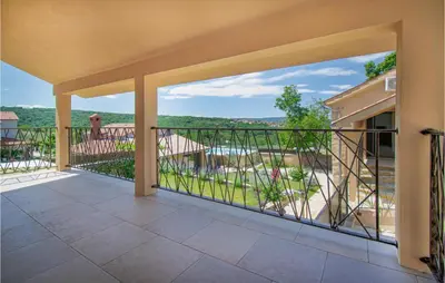 a view from the balcony of a house at Beautiful Home In Skofije in Plavje