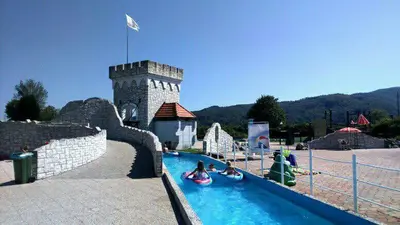 a group of people riding in a pool at a water park at Apartmán Perspekta 196 in Čatež ob Savi