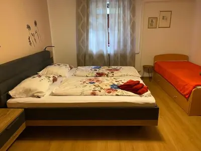 a bedroom with two beds in a room at Živahna hiša in Sveti Jurij ob Ščavnici