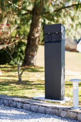 a black box sitting on the side of a street at Vila Slavc, cosy apartment near the lake in Bled