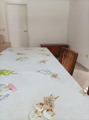 a white table with seashells on top of it at OASIS in Bovec
