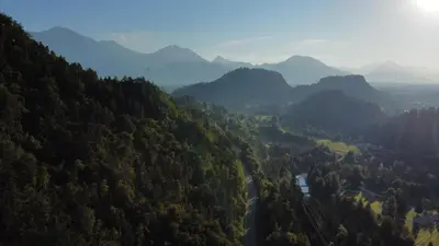 an aerial view of a valley with mountains and a road at Rock Apartments in Bohinjska Bela