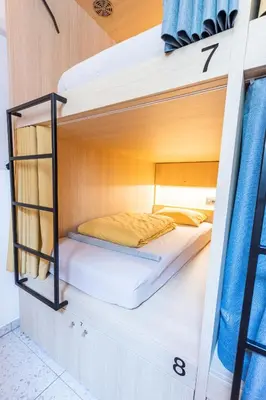a bunk bed in a bunk bedded room in a house at Boutique Hostel Angel in Ljubljana