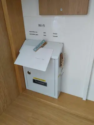 a box with a remote control sitting on top of it at Studio Kaninska vas in Bovec